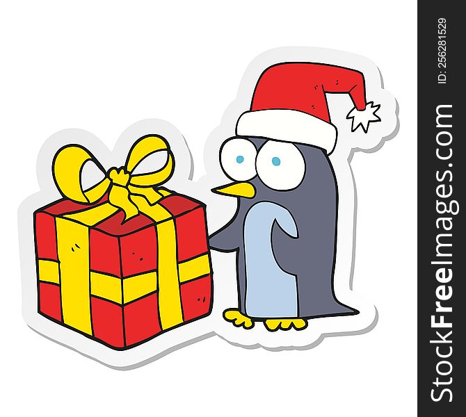 Sticker Of A Cartoon Christmas Penguin With Present
