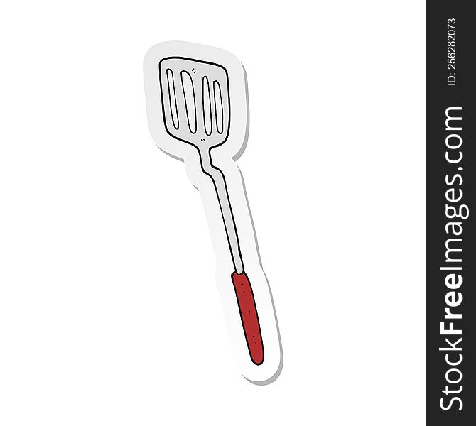sticker of a cartoon spatula