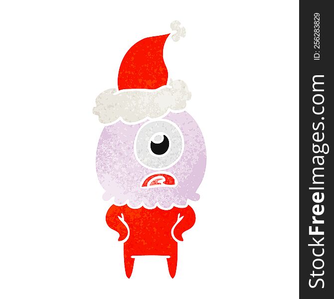 Retro Cartoon Of A Cyclops Alien Spaceman Wearing Santa Hat
