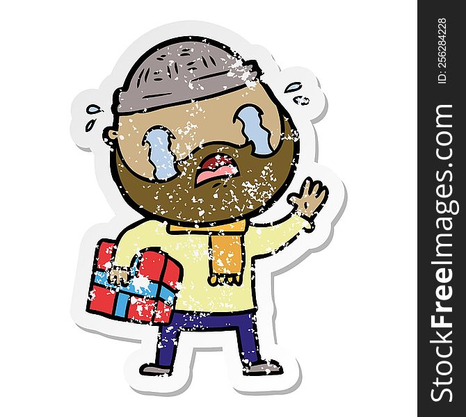 Distressed Sticker Of A Cartoon Bearded Man Crying With Christmas Present