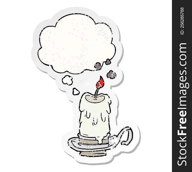cartoon spooky candle with thought bubble as a distressed worn sticker