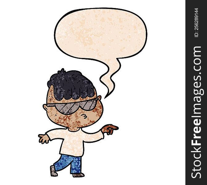 cartoon boy wearing sunglasses pointing with speech bubble in retro texture style