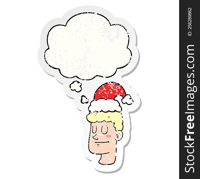 Cartoon Man Wearing Christmas Hat And Thought Bubble As A Distressed Worn Sticker