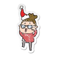 Distressed Sticker Cartoon Of A Happy Woman Wearing Spectacles Wearing Santa Hat Royalty Free Stock Photography