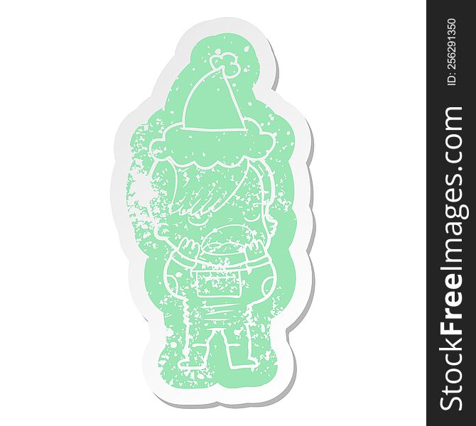 cartoon distressed sticker of a cool hipster girl in space suit wearing santa hat