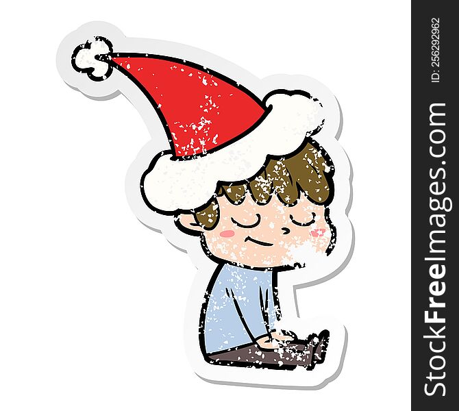 Distressed Sticker Cartoon Of A Happy Boy Wearing Santa Hat