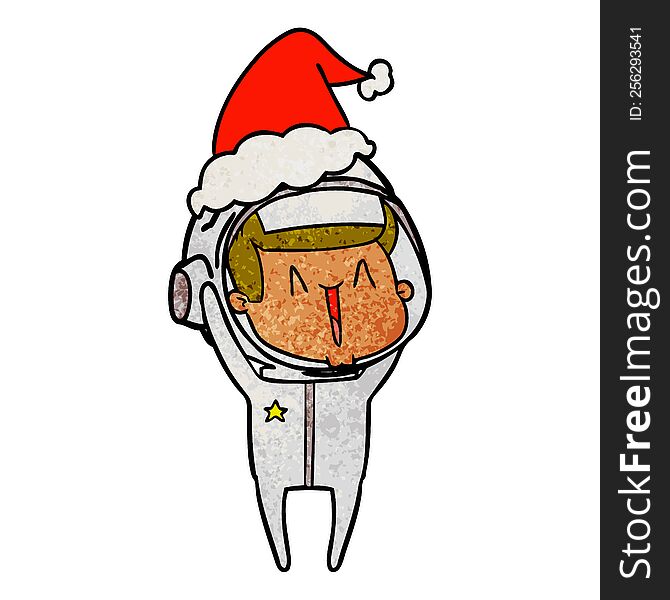 happy hand drawn textured cartoon of a astronaut wearing santa hat. happy hand drawn textured cartoon of a astronaut wearing santa hat
