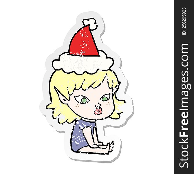 pretty distressed sticker cartoon of a elf girl wearing santa hat