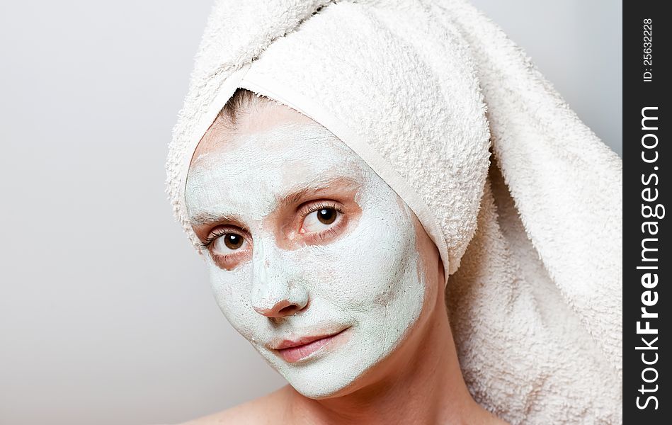Green Spa Facial Mask on woman face