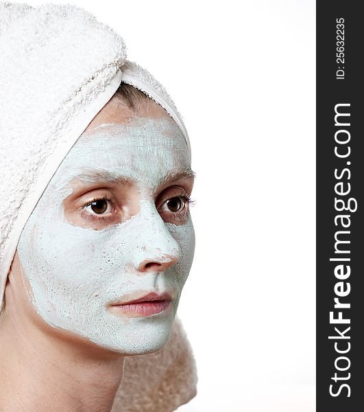 Green Spa Facial Mask on woman face