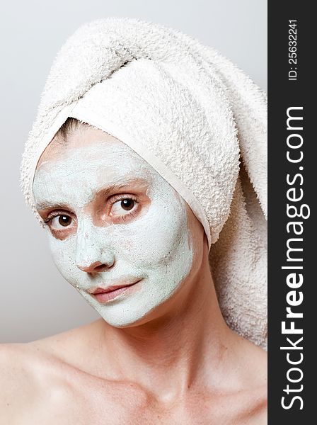 Green Spa Facial Mask on woman face