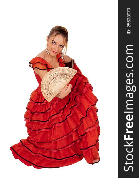 Young lady in red spanish dress holding a fan. Young lady in red spanish dress holding a fan