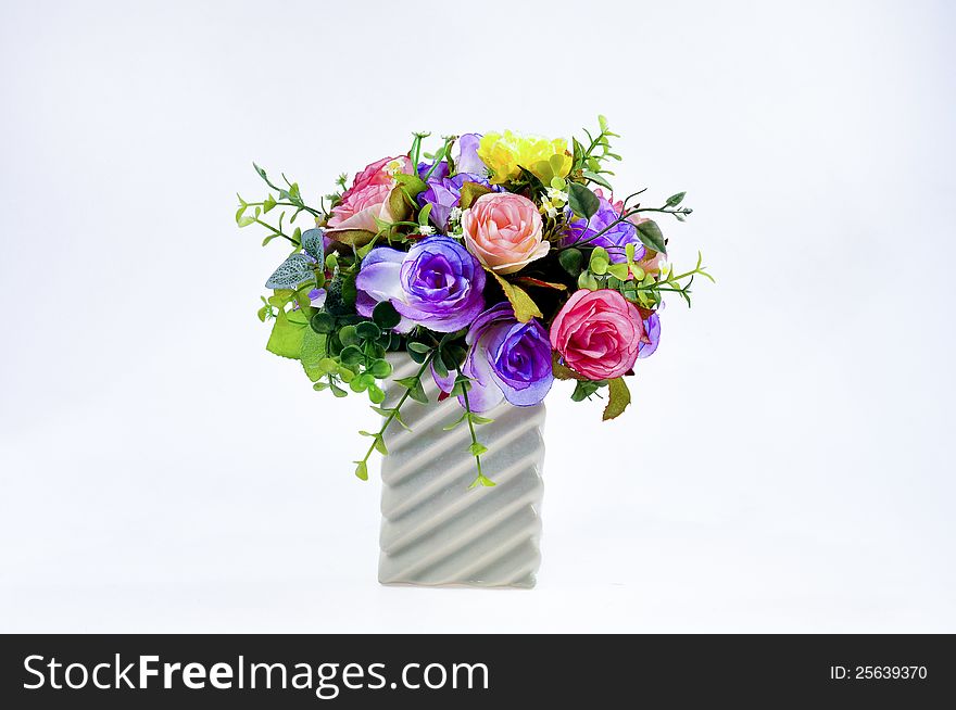Ceramic flower vase and plastic flower