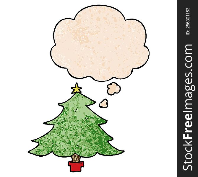 cartoon christmas tree with thought bubble in grunge texture style. cartoon christmas tree with thought bubble in grunge texture style