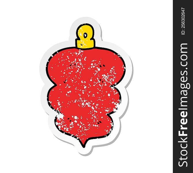 distressed sticker of a cartoon christmas bauble