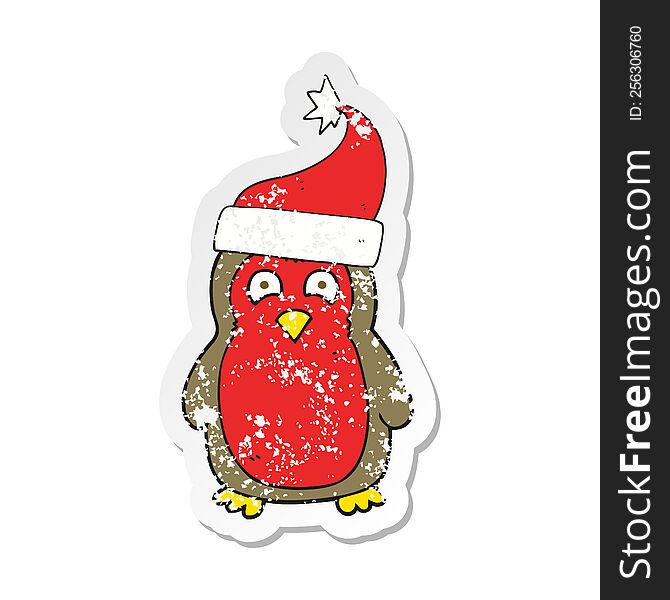 retro distressed sticker of a cartoon christmas robin wearing santa hat