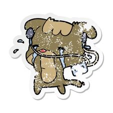 Distressed Sticker Of A Cartoon Sad Dog Listening To Music Stock Photo