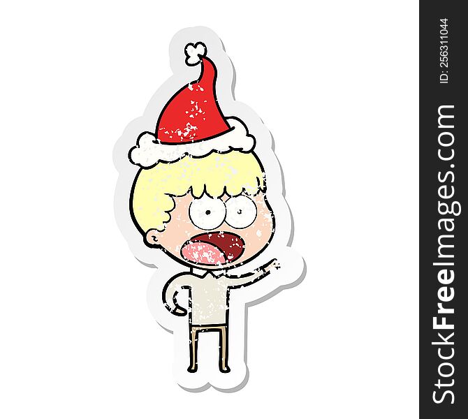 distressed sticker cartoon of a shocked man wearing santa hat