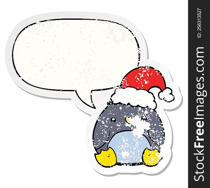 cute cartoon penguin wearing christmas hat and speech bubble distressed sticker