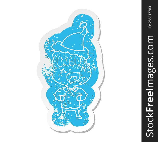 quirky cartoon distressed sticker of a happy boy laughing wearing santa hat