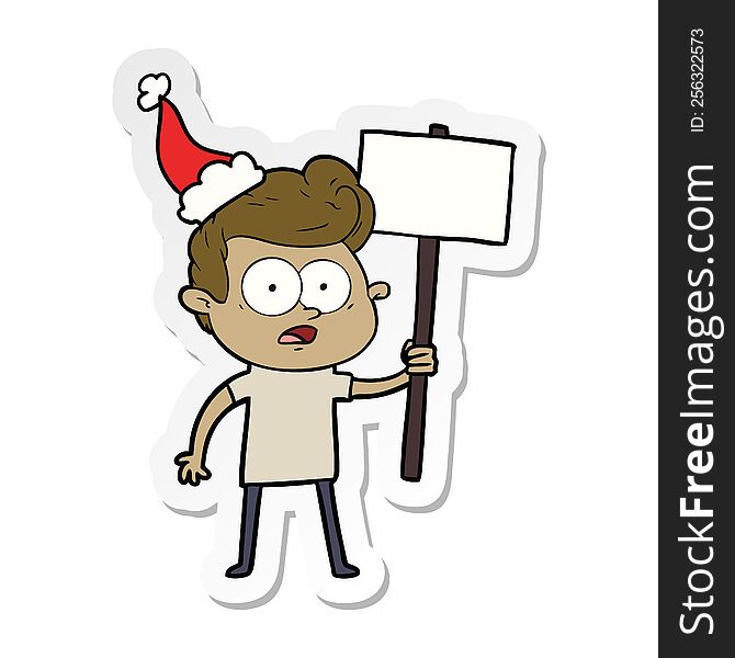 sticker cartoon of a staring man wearing santa hat