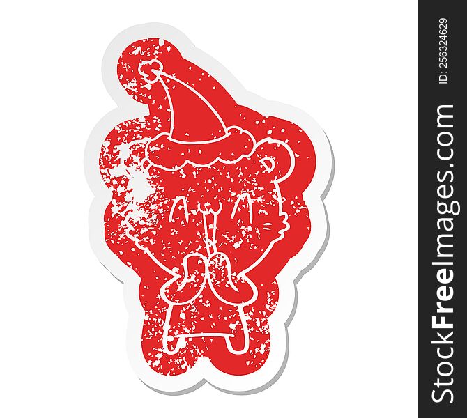 Happy Bear Cartoon Distressed Sticker Of A Wearing Santa Hat