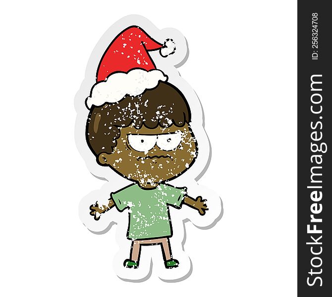 hand drawn distressed sticker cartoon of a angry man wearing santa hat