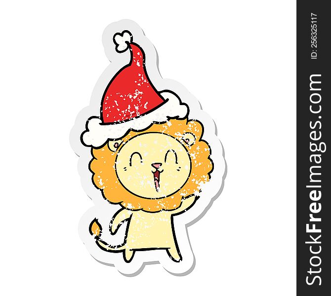 Laughing Lion Distressed Sticker Cartoon Of A Wearing Santa Hat
