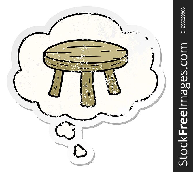 cartoon small stool with thought bubble as a distressed worn sticker