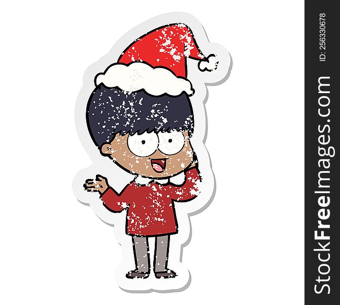 happy hand drawn distressed sticker cartoon of a boy wearing santa hat. happy hand drawn distressed sticker cartoon of a boy wearing santa hat
