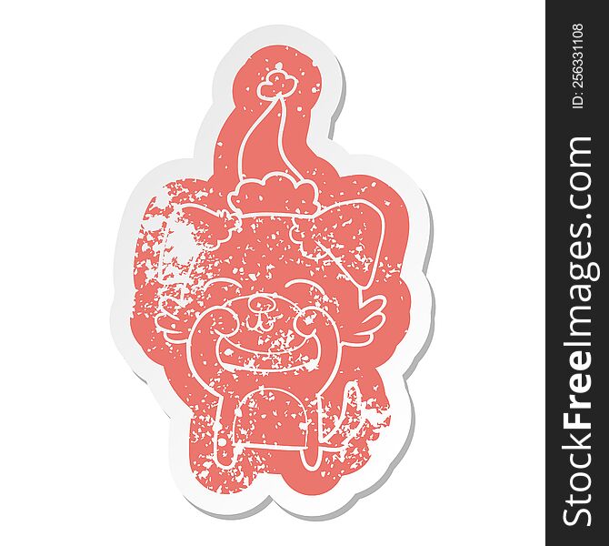 Cartoon Distressed Sticker Of A Dog Wearing Santa Hat