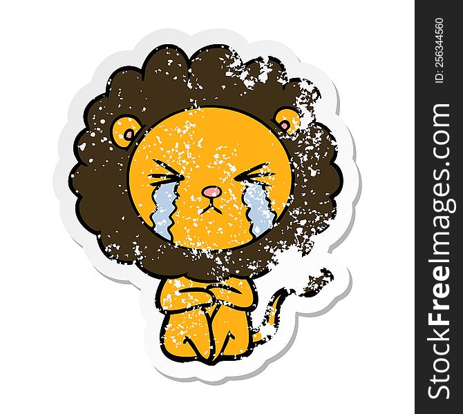 distressed sticker of a cartoon crying lion sitting huddled up
