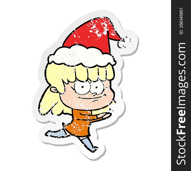 Distressed Sticker Cartoon Of A Smiling Woman Wearing Santa Hat