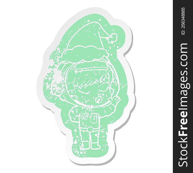 quirky cartoon distressed sticker of a pretty astronaut girl wearing santa hat