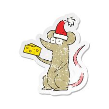 Retro Distressed Sticker Of A Cartoon Christmas Mouse With Cheese Royalty Free Stock Photo