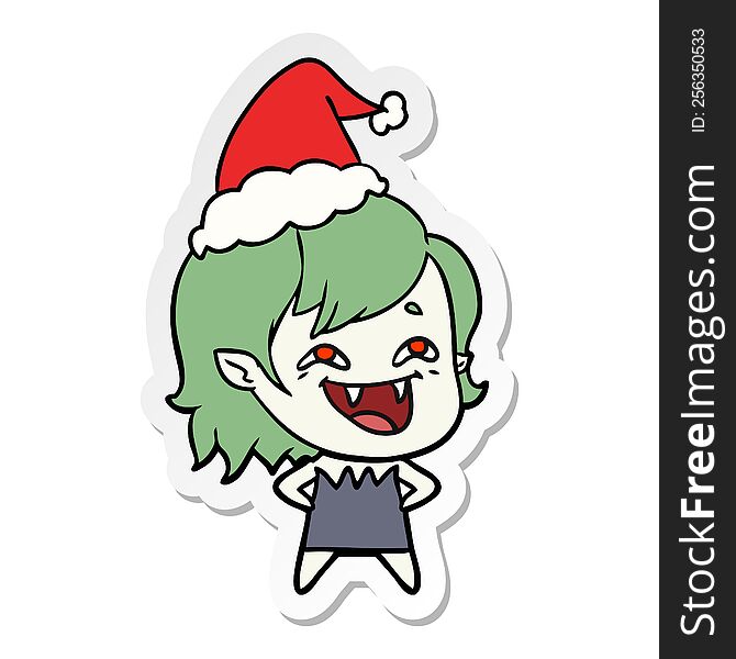 hand drawn sticker cartoon of a laughing vampire girl wearing santa hat