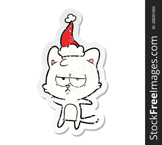 Bored Distressed Sticker Cartoon Of A Cat Wearing Santa Hat