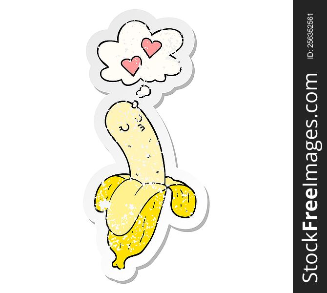 cartoon banana in love with thought bubble as a distressed worn sticker