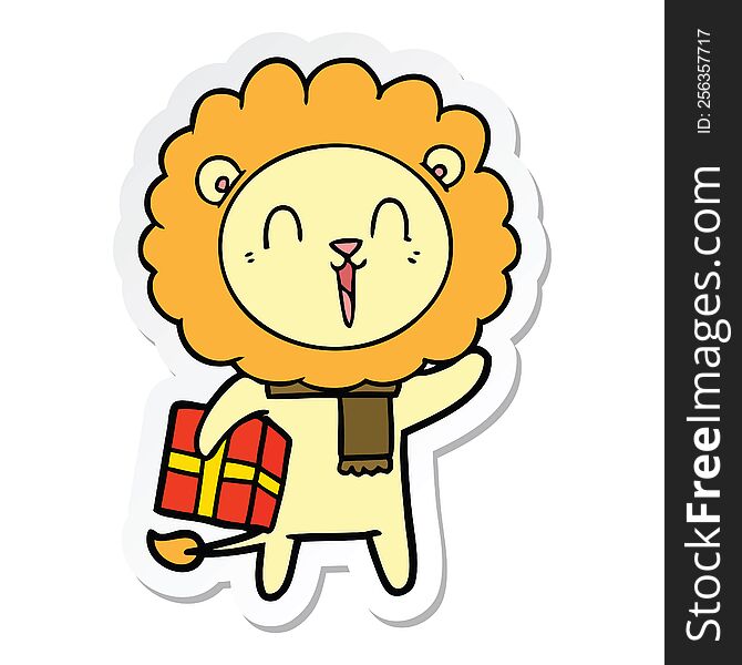 sticker of a laughing lion cartoon with christmas present