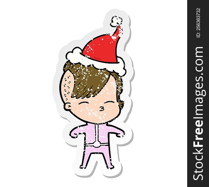 hand drawn distressed sticker cartoon of a girl wearing futuristic clothes wearing santa hat