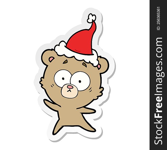 anxious bear hand drawn sticker cartoon of a wearing santa hat. anxious bear hand drawn sticker cartoon of a wearing santa hat