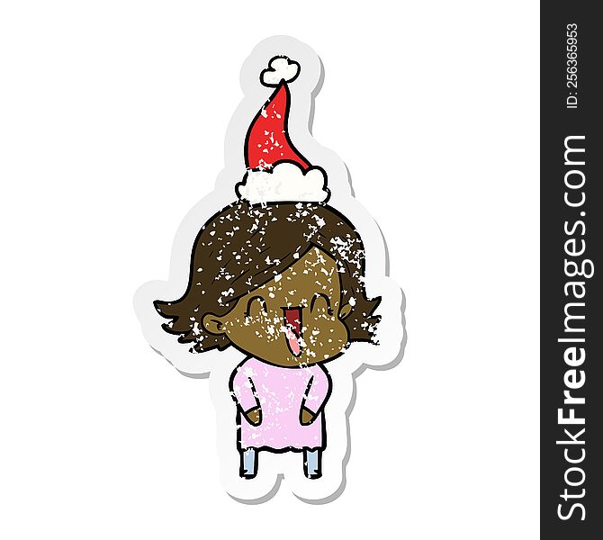 Distressed Sticker Cartoon Of A Laughing Woman Wearing Santa Hat