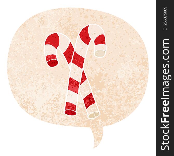 cartoon candy canes and speech bubble in retro textured style