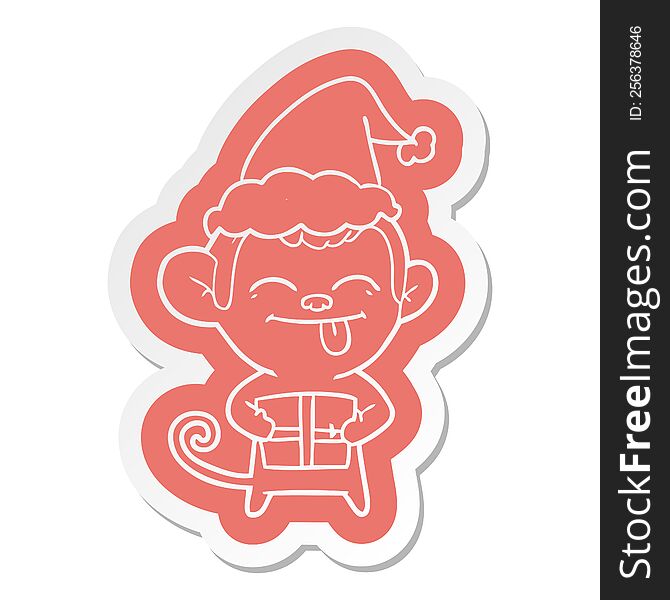 Funny Cartoon  Sticker Of A Monkey With Christmas Present Wearing Santa Hat