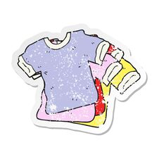 Free Retro Distressed Sticker Of A Cartoon T Shirts Royalty Free Stock Image - 256381506