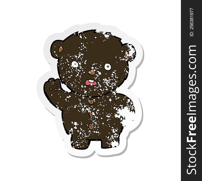 retro distressed sticker of a cartoon unhappy black teddy bear