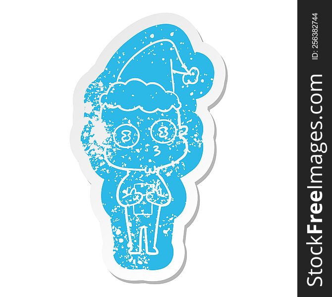 Cartoon Distressed Sticker Of A Weird Bald Spaceman Wearing Santa Hat