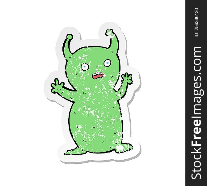 retro distressed sticker of a cartoon funny little alien