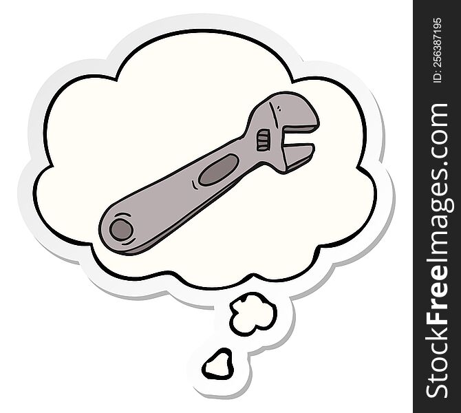 cartoon spanner with thought bubble as a printed sticker