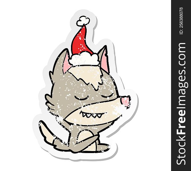friendly hand drawn distressed sticker cartoon of a wolf sitting wearing santa hat
